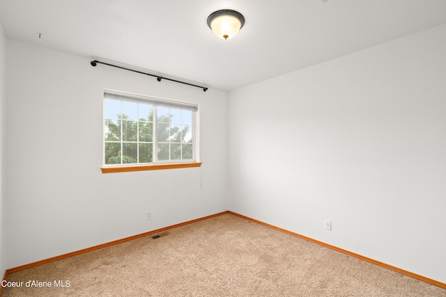 2867 W Tours Dr, Coeur Dalene, ID 83815 - spare room with carpet and baseboards