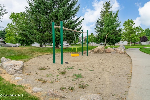 2867 W Tours Dr, Coeur Dalene, ID 83815 - communal playground with a yard