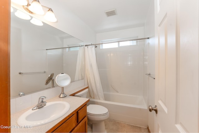 2867 W Tours Dr, Coeur Dalene, ID 83815 - full bath featuring vanity, shower / bath combo with shower curtain, tile patterned floors, and decorative backsplash