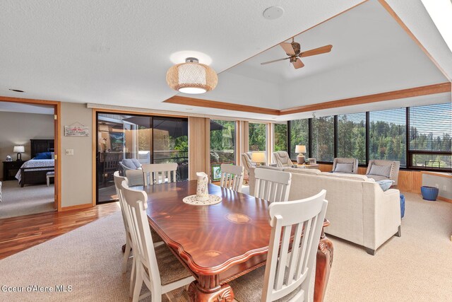 3574 E Tobler Rd # C16, Hayden, ID 83835 - dining area with a ceiling fan, light wood-type flooring, and a textured ceiling