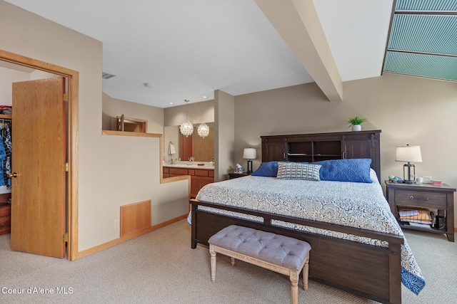 3574 E Tobler Rd # C16, Hayden, ID 83835 - bedroom with light carpet, ensuite bath, and a spacious closet