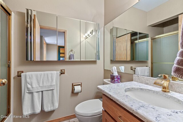 3574 E Tobler Rd # C16, Hayden, ID 83835 - bathroom with vanity and a shower with door