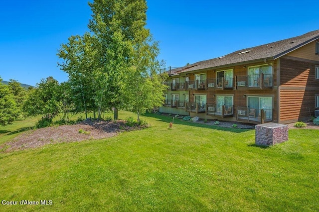 112 Holiday Loop Unit 838, Blanchard, ID 83804 - view of grassy yard with a balcony