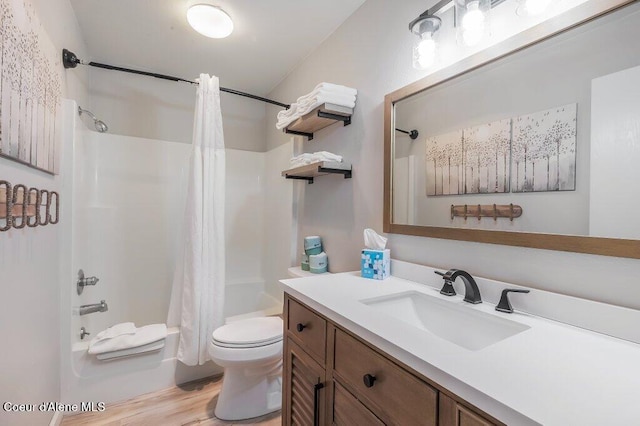 112 Holiday Loop Unit 838, Blanchard, ID 83804 - full bath featuring shower / bath combo with shower curtain, vanity, toilet, and wood finished floors