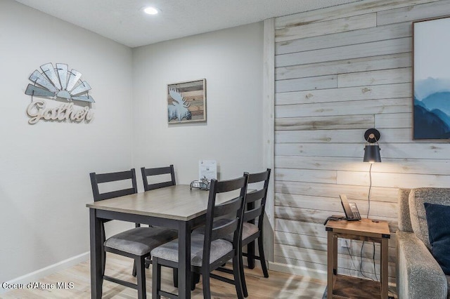 112 Holiday Loop Unit 838, Blanchard, ID 83804 - dining space with wood finished floors, baseboards, and recessed lighting