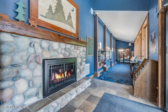 112 Holiday Loop Unit 838, Blanchard, ID 83804 - foyer entrance featuring stone finish floors, a stone fireplace, and baseboards