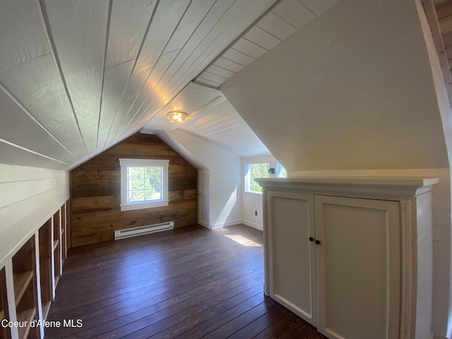 118 Faye St, Mullan, ID 83846 - bonus room with baseboard heating, dark wood-style floors, wood walls, and lofted ceiling