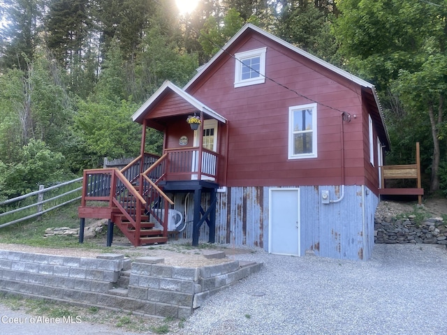 118 Faye St, Mullan, ID 83846 - view of front facade with stairs and a deck