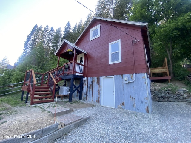 118 Faye St, Mullan, ID 83846 - rear view of property with stairway and a wooden deck