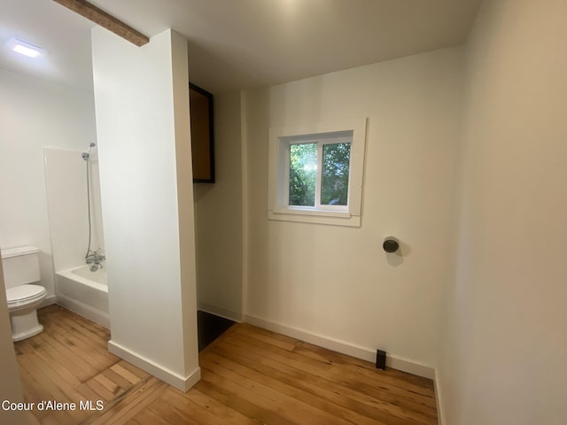 118 Faye St, Mullan, ID 83846 - laundry room featuring light wood finished floors and baseboards