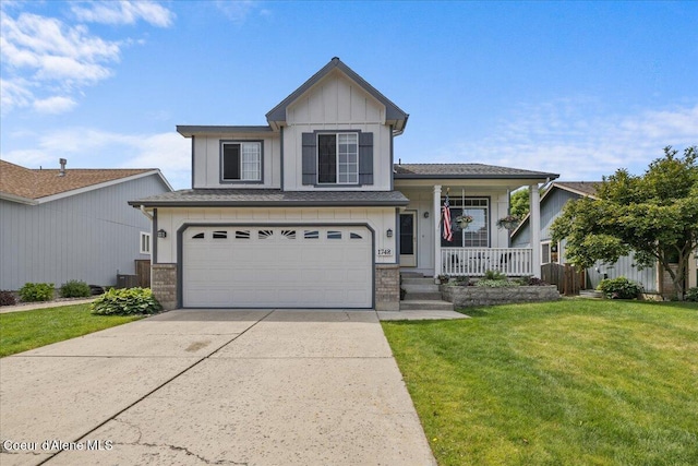 1748 W Durham Dr, Coeur Dalene, ID 83815 - view of front facade with a porch, concrete driveway, a front lawn, an attached garage, and brick siding