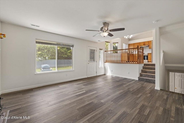1748 W Durham Dr, Coeur Dalene, ID 83815 - unfurnished living room featuring stairway, a ceiling fan, dark wood finished floors, and baseboards