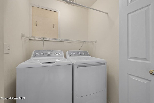 1748 W Durham Dr, Coeur Dalene, ID 83815 - laundry room with washer and dryer
