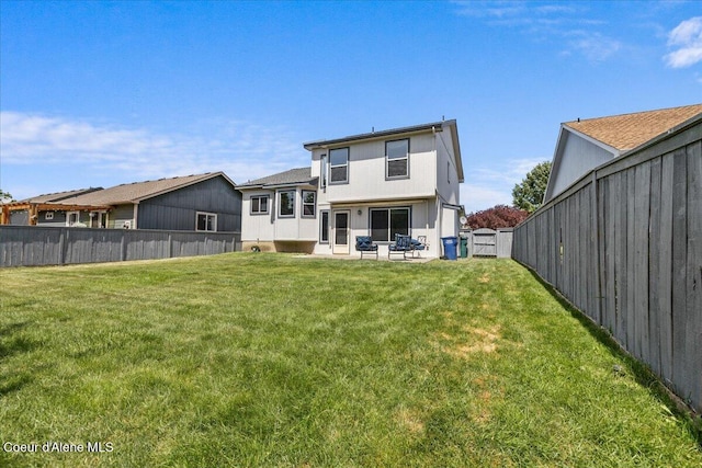 1748 W Durham Dr, Coeur Dalene, ID 83815 - rear view of property with a patio area