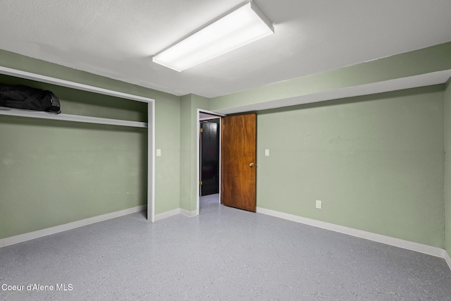 1364 C St, Plummer, ID 83851 - unfurnished bedroom featuring speckle patterned floor, baseboards, and a closet