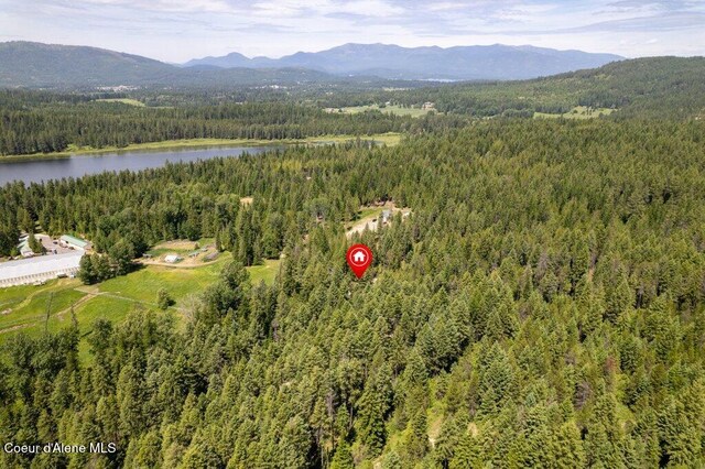 122 Cottonwood Dr, Sagle, ID 83860 - view of property location with a heavily wooded area and a water and mountain view