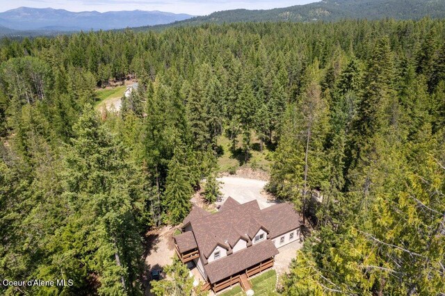 122 Cottonwood Dr, Sagle, ID 83860 - view from above of property with a forest and a mountainous background