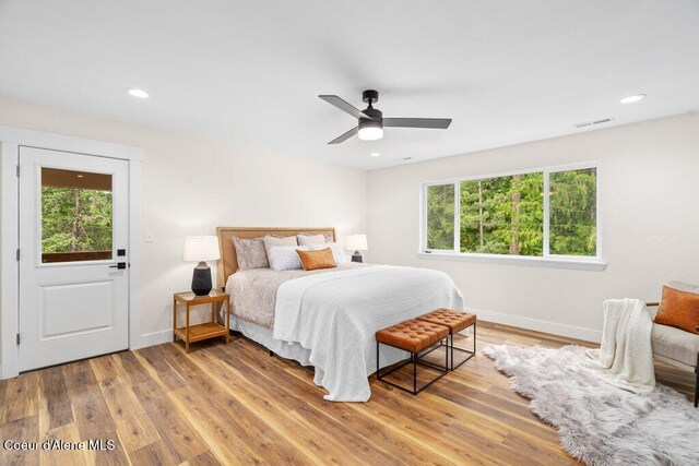 122 Cottonwood Dr, Sagle, ID 83860 - bedroom featuring wood finished floors, a ceiling fan, and recessed lighting