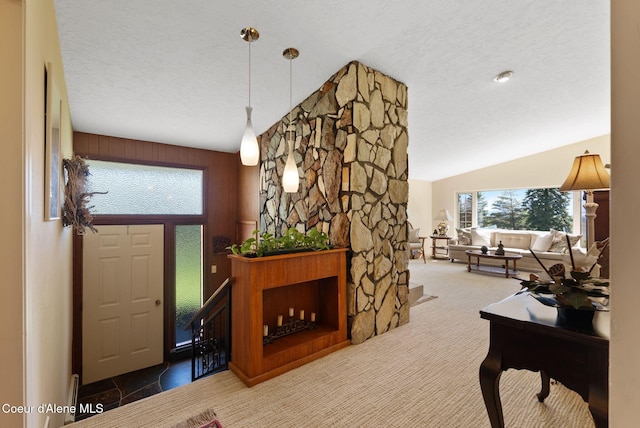 10851 W Pine St, Sandpoint, ID 83864 - hallway with a textured ceiling, carpet flooring, and lofted ceiling