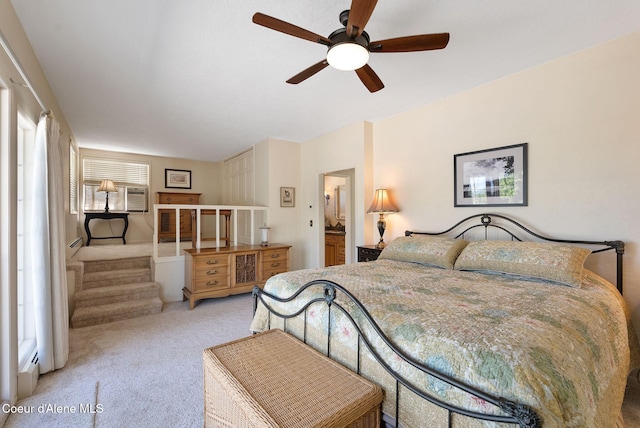 10851 W Pine St, Sandpoint, ID 83864 - carpeted bedroom with a ceiling fan and cooling unit