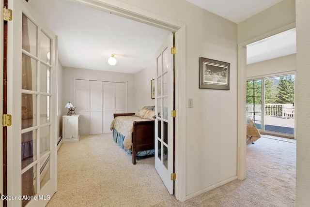 10851 W Pine St, Sandpoint, ID 83864 - bedroom featuring carpet floors, access to exterior, french doors, and a closet