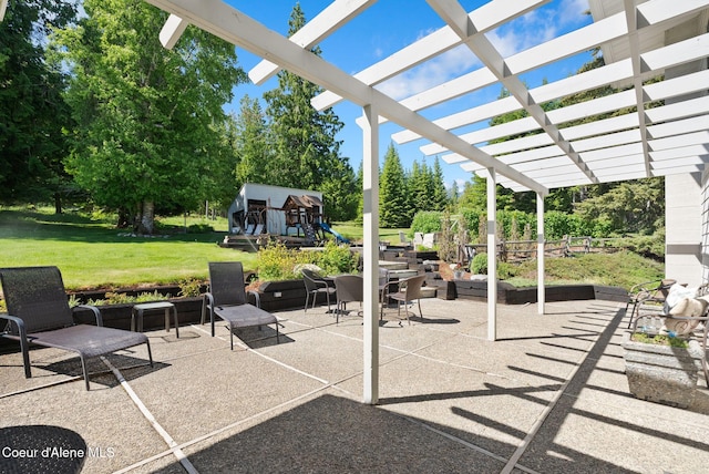 10851 W Pine St, Sandpoint, ID 83864 - view of patio / terrace featuring a pergola and view of scattered trees