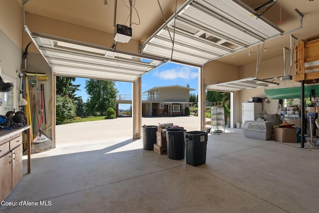 10851 W Pine St, Sandpoint, ID 83864 - garage featuring a garage door opener
