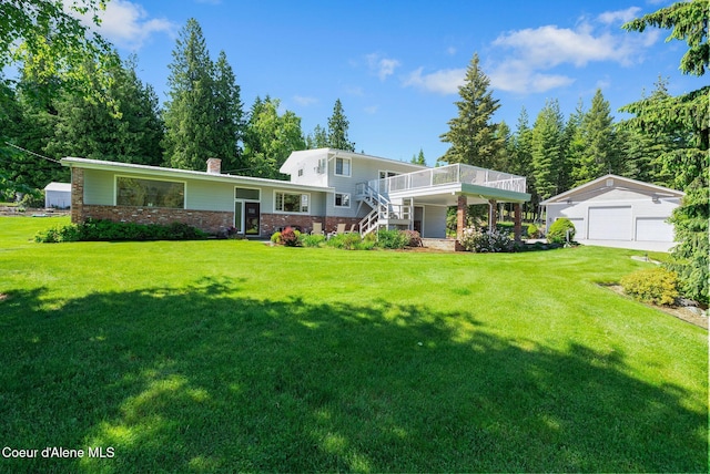 10851 W Pine St, Sandpoint, ID 83864 - back of house featuring stairs, a garage, a chimney, a deck, and an outdoor structure