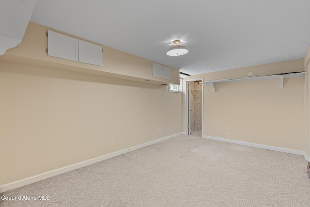 221 S Ridgewood Dr, Post Falls, ID 83854 - below grade area with light carpet and baseboards