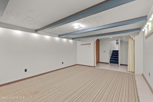 221 S Ridgewood Dr, Post Falls, ID 83854 - finished below grade area featuring light colored carpet and stairway