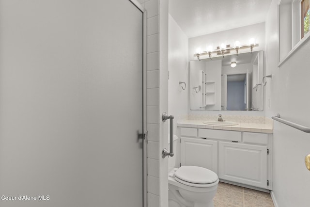 221 S Ridgewood Dr, Post Falls, ID 83854 - bathroom featuring vanity, tile patterned floors, and a shower stall