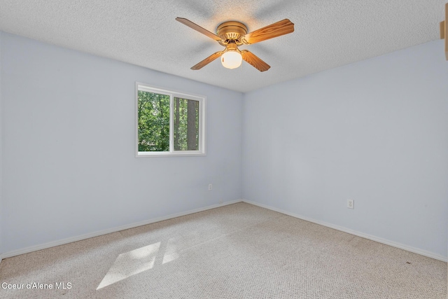 221 S Ridgewood Dr, Post Falls, ID 83854 - carpeted spare room featuring ceiling fan and a textured ceiling