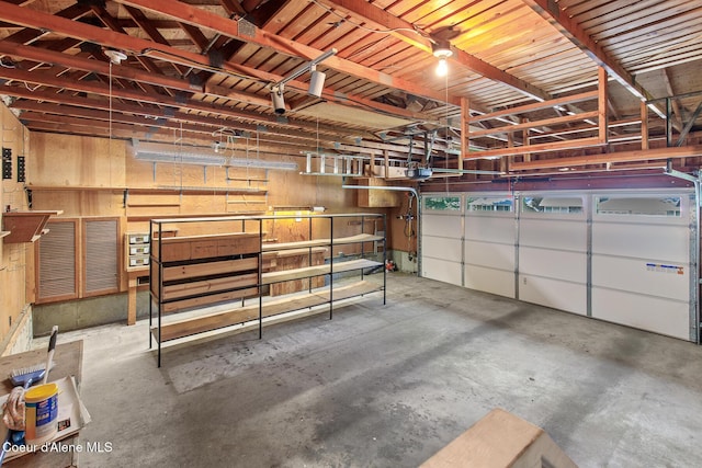 221 S Ridgewood Dr, Post Falls, ID 83854 - garage featuring a garage door opener