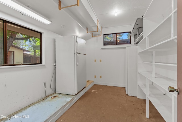 221 S Ridgewood Dr, Post Falls, ID 83854 - basement featuring freestanding refrigerator