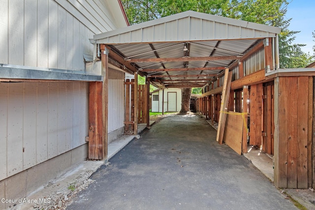 221 S Ridgewood Dr, Post Falls, ID 83854 - view of car parking featuring a carport and asphalt driveway