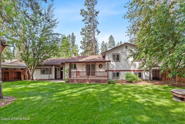 221 S Ridgewood Dr, Post Falls, ID 83854 - back of property featuring a fenced backyard