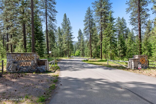 221 S Ridgewood Dr, Post Falls, ID 83854 - view of asphalt street with a wooded view