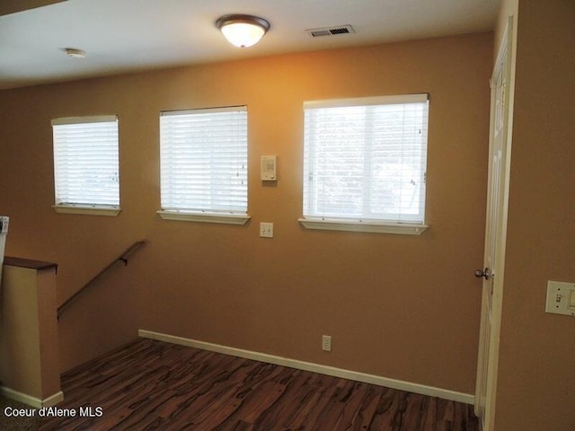 3696 N Steven Pl, Coeur Dalene, ID 83815 - stairs with healthy amount of natural light, wood finished floors, and baseboards