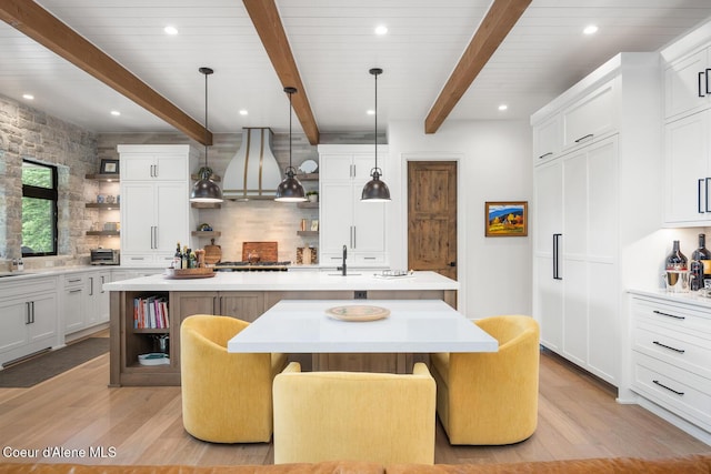 6767 S Renaissance Way, Coeur Dalene, ID 83814 - kitchen featuring open shelves, light wood-style floors, beam ceiling, and recessed lighting