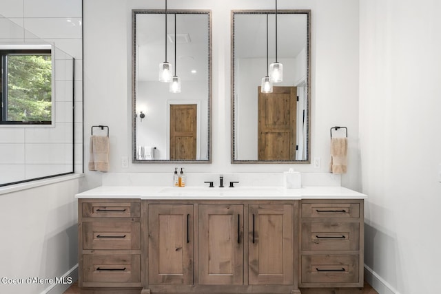 6767 S Renaissance Way, Coeur Dalene, ID 83814 - bathroom with vanity and baseboards