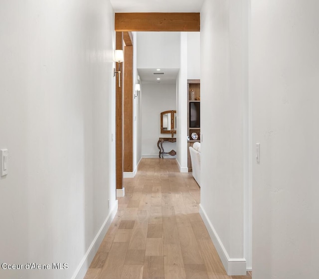 6767 S Renaissance Way, Coeur Dalene, ID 83814 - hall with light wood finished floors and beamed ceiling
