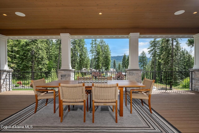 6767 S Renaissance Way, Coeur Dalene, ID 83814 - wooden terrace featuring outdoor dining space and a mountain view