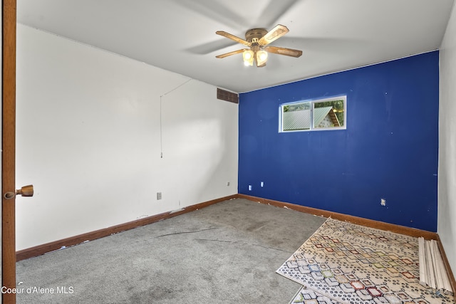 206 E 2nd Ave, Clark Fork, ID 83811 - carpeted spare room with ceiling fan and baseboards