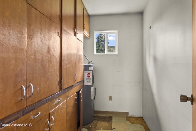 206 E 2nd Ave, Clark Fork, ID 83811 - utility room featuring water heater