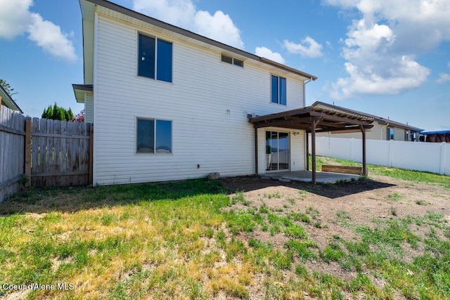 3551 N Carriage Ct, Post Falls, ID 83854 - back of property with a patio and a fenced backyard