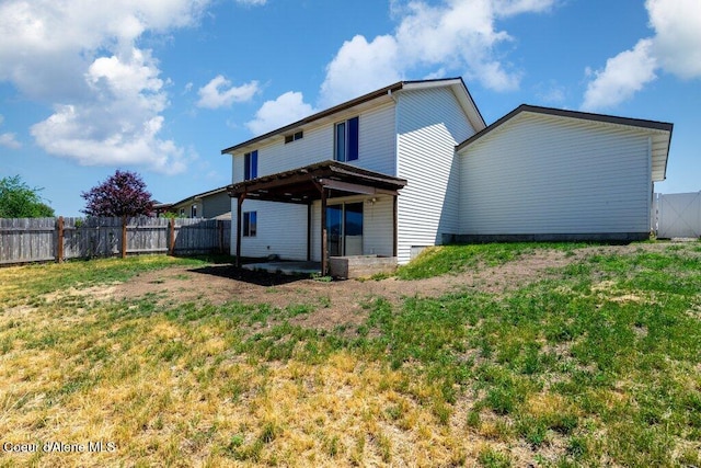 3551 N Carriage Ct, Post Falls, ID 83854 - rear view of property featuring a fenced backyard and a patio