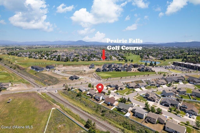 3551 N Carriage Ct, Post Falls, ID 83854 - aerial view of property's location featuring nearby suburban area and a water and mountain view