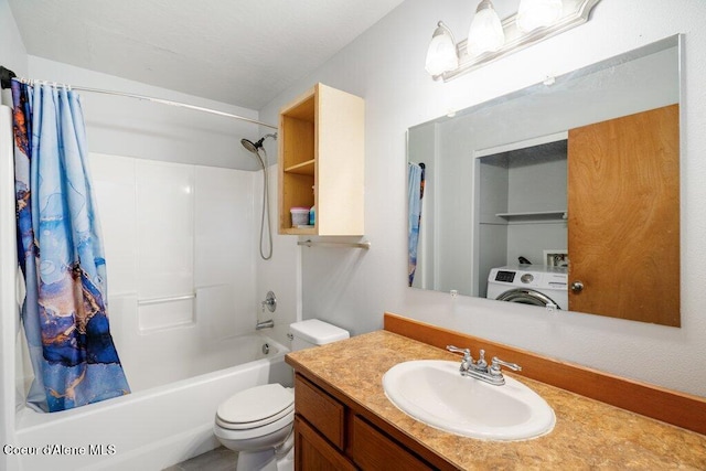 3551 N Carriage Ct, Post Falls, ID 83854 - full bathroom featuring washer / clothes dryer, shower / bath combo with shower curtain, and vanity