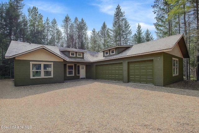 84 E Cabinet Wagon Rd, Clark Fork, ID 83811 - view of front of home featuring an attached garage and driveway
