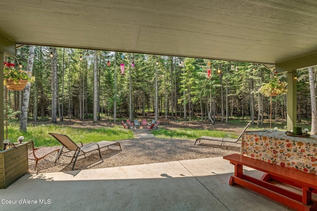 84 E Cabinet Wagon Rd, Clark Fork, ID 83811 - view of patio featuring a forest view
